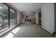Spacious living room featuring large windows with natural light and a view of the outdoors at 206 Rochelle Dr, Knightdale, NC 27545