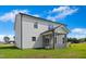 View of home exterior showing screened porch, siding, roof, and manicured lawn at 21 Green Links Dr, Cameron, NC 28326