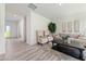 Bright living room featuring neutral tones, stylish decor, and ample natural light at 21 Green Links Dr, Cameron, NC 28326