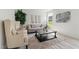 Cozy living room featuring comfortable seating, neutral tones, and natural light at 21 Green Links Dr, Cameron, NC 28326