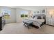 Serene main bedroom with large windows, neutral tones, and comfortable furnishings at 21 Green Links Dr, Cameron, NC 28326