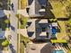 An aerial view shows the home, neighboring properties, and community streets at 212 Blue Granite Dr, Holly Springs, NC 27540