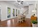 Open dining area with French door access to the screened porch and staircase at 212 Blue Granite Dr, Holly Springs, NC 27540