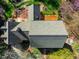An aerial view showcases the expansive roof and meticulous landscaping of this beautiful home at 213 Huntington Dr, Chapel Hill, NC 27514