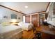 Spacious bedroom with hardwood floors, twin beds, and versatile layout with a desk at 213 Huntington Dr, Chapel Hill, NC 27514