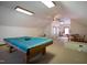 Large bonus room area with a pool table, neutral carpet, and natural light at 213 Huntington Dr, Chapel Hill, NC 27514