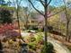 Exterior of a home featuring a landscaped front yard and colorful trees and bushes at 213 Huntington Dr, Chapel Hill, NC 27514
