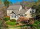 An inviting home featuring a large patio, sunroom, and a pergola-covered outdoor area at 213 Huntington Dr, Chapel Hill, NC 27514