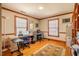Bright home office with hardwood floors, natural light, and wood trim at 213 Huntington Dr, Chapel Hill, NC 27514