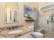 Stylish bathroom featuring granite counters, glass shower, and modern fixtures at 227 Windlestraw, Pittsboro, NC 27312