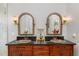 Nicely updated bathroom features dual sinks, wood cabinets, bronze fixtures and plenty of storage at 227 Windlestraw, Pittsboro, NC 27312
