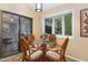 Breakfast Nook is light and bright with its sliding glass door and view to the mature garden at 227 Windlestraw, Pittsboro, NC 27312