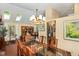 Formal dining room offering lots of seating and seamless flow to kitchen and living room at 227 Windlestraw, Pittsboro, NC 27312