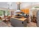 Bright kitchen featuring a modern island cooktop and breakfast area with lots of windows at 227 Windlestraw, Pittsboro, NC 27312