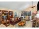 Cozy living room with fireplace, comfortable seating, and access to other parts of the home at 227 Windlestraw, Pittsboro, NC 27312