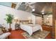Cozy bedroom with a metal ceiling, a bed, and warm, inviting decor at 2281 Lamont Norwood, Pittsboro, NC 27312