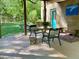 Covered patio with seating area and view of the yard at 2281 Lamont Norwood, Pittsboro, NC 27312
