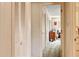 Interior hallway shot featuring a linen closet, door frames and carpeted floors at 2510 Poplar Creek Rd, Henderson, NC 27537