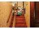 Interior view of the old stairs with a stair lift at 2510 Poplar Creek Rd, Henderson, NC 27537