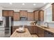 Kitchen featuring stainless steel appliances, granite counters, and shaker style cabinets at 275 Sunrise Ridge Dr, Willow Springs, NC 27592