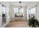 Cozy room with a sliding glass door, pendant lights and a modern coffee bar setup at 275 Sunrise Ridge Dr, Willow Springs, NC 27592