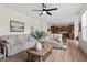 Spacious living room seamlessly connects to the kitchen, offering a comfortable and open-concept living space at 275 Sunrise Ridge Dr, Willow Springs, NC 27592