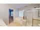 Modern bathroom with separate tub and glass-enclosed shower; tile flooring at 2750 Laurelcherry St, Raleigh, NC 27612