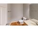 Half bathroom featuring wood floors, a toilet, and a sink with vanity at 2750 Laurelcherry St, Raleigh, NC 27612