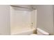 Clean bathroom featuring a white tub/shower combo and modern fixtures at 2750 Laurelcherry St, Raleigh, NC 27612