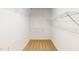 Walk-in closet with white wire shelving provides ample storage at 2750 Laurelcherry St, Raleigh, NC 27612