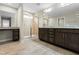 Stylish primary bathroom featuring double sinks, granite countertops, and a large tiled shower at 2901 Murray Ridge Trl, Apex, NC 27502