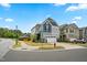 Two-story home with a two car garage on a corner lot and a red fire hydrant at 2901 Murray Ridge Trl, Apex, NC 27502