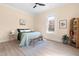 Calm bedroom featuring a full bed with woven bench and an accent rug for a comfortable feel at 314 Bledsoe Ave, Raleigh, NC 27601