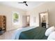 Bedroom featuring neutral walls, natural light, and ensuite bathroom with a modern vanity at 314 Bledsoe Ave, Raleigh, NC 27601