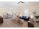 Bright, open-concept living room and dining area with neutral walls, hardwood floors, and stylish furnishings at 314 Bledsoe Ave, Raleigh, NC 27601