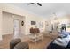 Spacious living area with contemporary decor, including a ceiling fan, area rug, and hardwood floors at 314 Bledsoe Ave, Raleigh, NC 27601
