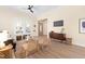 Inviting living room with sleek furniture, hardwood flooring, and neutral-toned decor for a modern aesthetic at 314 Bledsoe Ave, Raleigh, NC 27601