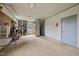 Spacious garage with white painted walls, concrete floors, and built-in shelving at 3646 Watkins Farm Rd, Hillsborough, NC 27278