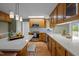 Spacious kitchen featuring granite countertops, custom cabinets, and stainless steel appliances, a chef's dream at 3646 Watkins Farm Rd, Hillsborough, NC 27278