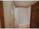 This bathroom showcases a shower and tub with a white shower curtain at 3813 W West Lake Rd, Apex, NC 27539
