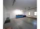 Spacious garage featuring abundant room, work bench, and natural light from two windows at 3813 W West Lake Rd, Apex, NC 27539