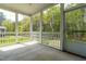 Inviting screened porch that overlooks the backyard and offers a peaceful area for relaxation at 408 Price Lake Way, Fuquay Varina, NC 27526