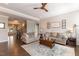 Open-concept living area with hardwood floors and abundant natural light at 4424 Bonnie Loch Dr, Burlington, NC 27215