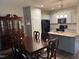 Open kitchen and dining area with an island, perfect for entertaining and Gathering meals at 48 Cullen Ct, Clayton, NC 27520