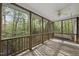 Spacious back porch with swing to take in the views of the surrounding woods at 50 Beech Trl, Garner, NC 27529