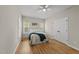Bright bedroom with wood floors, lots of natural light, and a double door closet at 50 Beech Trl, Garner, NC 27529