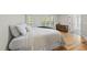 Spacious bedroom with hardwood floors, large windows, and neutral décor at 50 Beech Trl, Garner, NC 27529