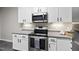 Well-equipped kitchen featuring stainless steel appliances and sleek cabinetry at 50 Beech Trl, Garner, NC 27529