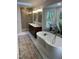 Luxurious bathroom featuring a soaking tub, large shower, double vanity and lots of natural light at 510 Braden Dr, Durham, NC 27713