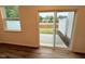 Sliding glass doors lead to a concrete patio and outdoor space at 512 Eastwood St, Durham, NC 27704